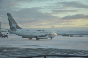 A plane waits on the tarmac of Iqaluit's airport Nov. 22. After flying all the way to Igloolik, my plane turned around headed back for Iqaluit because groundstaff woudln't have been able to de-ice the plane for its next trip, the pilot said. 